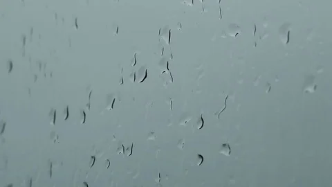 Drops of water run down the glass Stock Footage 75559344