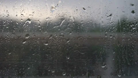 Drops of water run down the glass 4K Stock Footage 112683133
