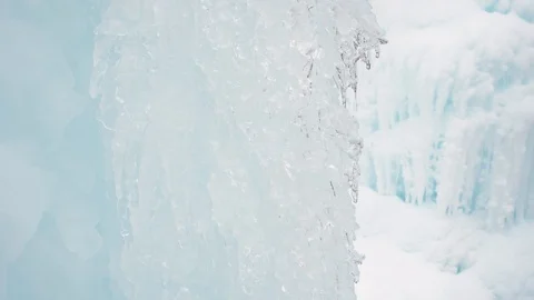 Drops of water run down the ice block Stock Footage 102032373