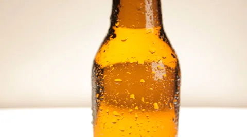 Drops of water running down the bottle Video stock 62895248
