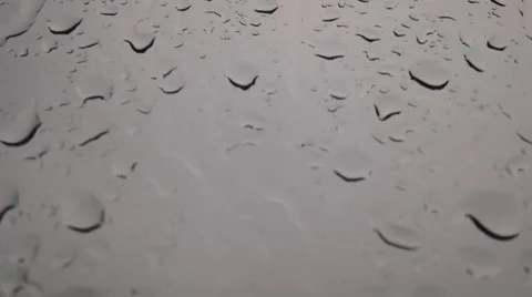 Drops of water running down a window Stock Footage 47899332