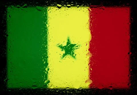 Drops of water on Senegal flag background. Shallow depth of field. Selectiv.. Stock Photos