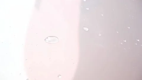 Drops water slide on the surface. Raindrops move on the glass. Drip condensate Stock Footage 231517705