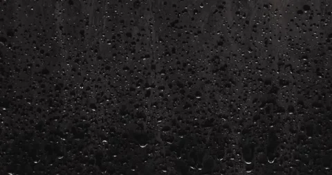 Drops of water sliding down Stock Footage 324877370