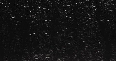 Drops of water sliding down Stock Footage 324877382