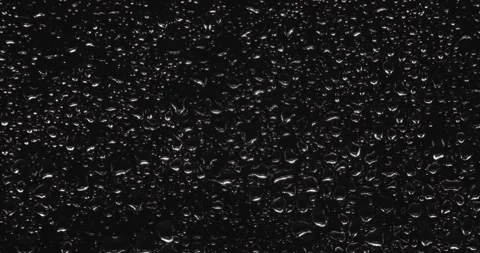 Drops of water sliding down Stock Footage 324877383