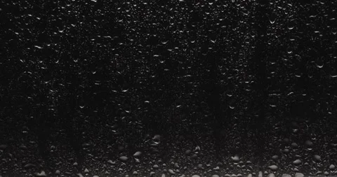 Drops of water sliding down Stock Footage 324877384