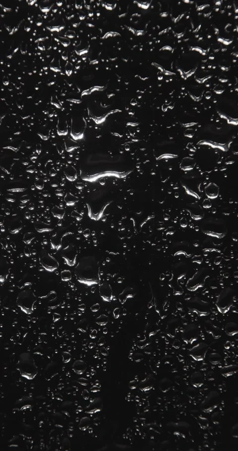 Drops of water sliding down Stock Footage 324877389