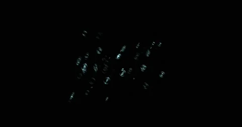 Drops of water splashes fly and fall, motion graphics of rain bubbles on a black Stock Footage 201384540