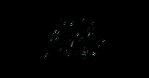 Drops of water splashes fly and fall, motion graphics of rain bubbles on a black Illustrazione stock