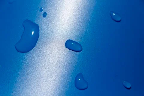 Drops of water on the surface Stock Photos