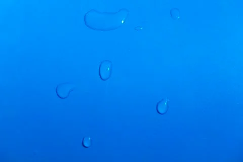 Drops of water on the surface Stock Photos