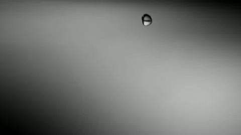 Drops of water on the water surface, close-up Stock Footage 11282806