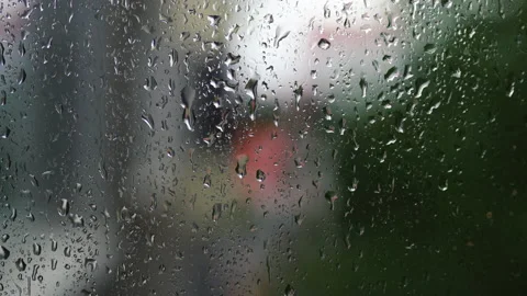 Drops of water on the window. camera movement along wet glass on a rainy day Stock-Footage 155689238