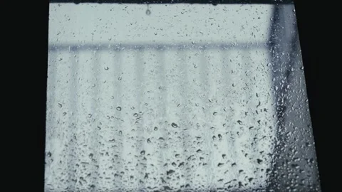 Drops of water on the windows after rain, close-up of rain. Stock Footage 326486298