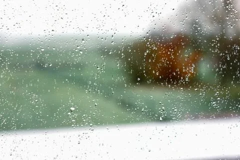 Drops on a window with a beautiful background Stock-Fotos