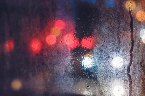 Drops on window with blurry background Stock Photos