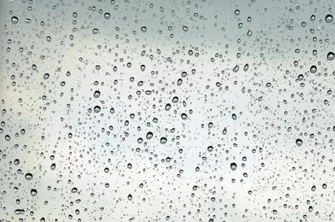 Drops on window Stock Photos
