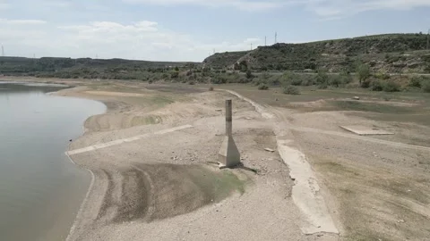 Drought effect on the Ebro River shore Stock Footage 259877337