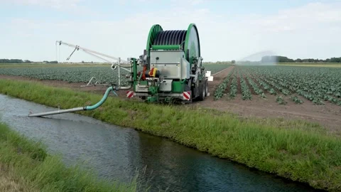 Drought in The Netherlands, Irrigating Crops With Pumped Canal Water Stock Footage 341880603