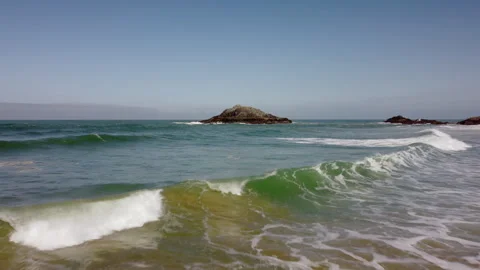Drove view of waves on the ocean flying over the top of them Stock-Footage 260324360