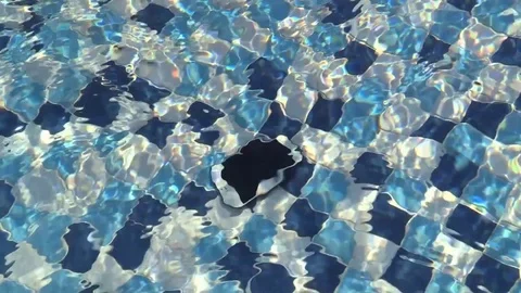 Drown smartphone lay under water waves at pool bottom. slow motion. Video stock 79193941