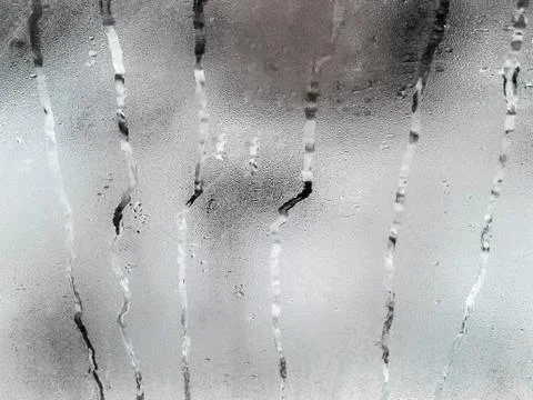 Drowned glass on the window Stock Photos