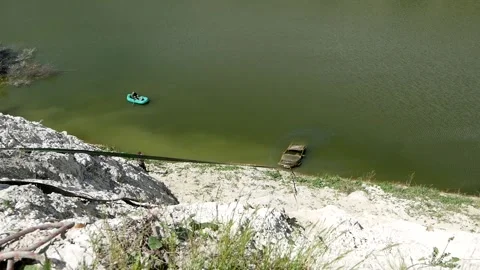 Drowned jeep car is pulled out of the water Video stock 146649579