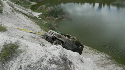 Drowned jeep car is pulled out of the water Video stock 146793407