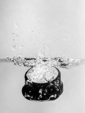 Drowning clock in the water Stock Photos