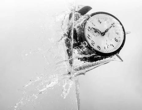 Drowning clock in the water Stock-Fotos