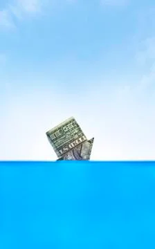 Drowning in Debt Foto stock