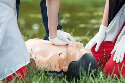 Drowning first aid. CPR. Stock Photos