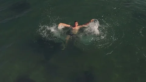 Drowning man in sea Stock Footage 97998899