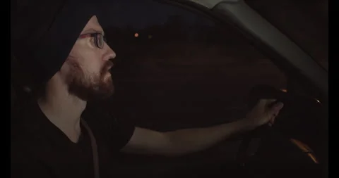 Drowsy Driver keeping self awake slapping Stock-Footage 245400399