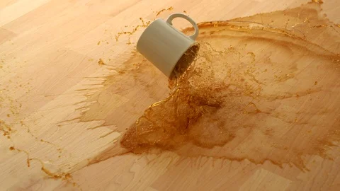 Drpping cup of coffee and breaking on wooden floor, Slow Motion Stock Footage 85654137