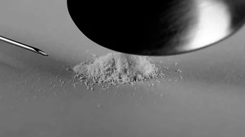 Drug dose with spoon Stock Footage 72634381