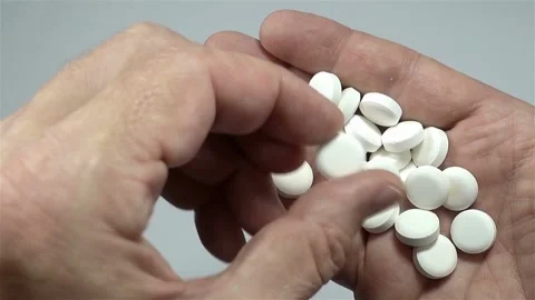 Drug over dose Concept Many Pills. Macro Of Hand Holding Several Pill Healthcare Video stock 336586290