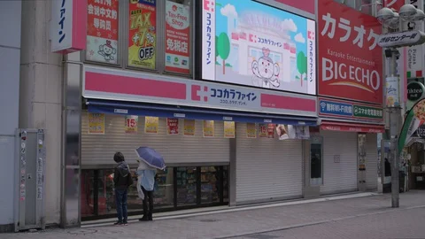 Before drug store opens in Tokyo Stock Footage 128174267