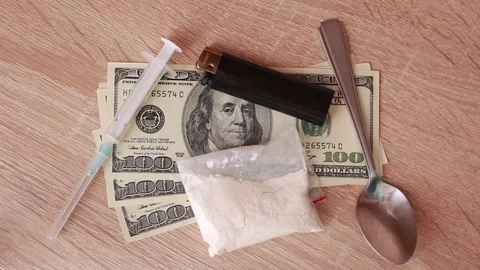 Drugs and dollars on the table 動画素材 83950108