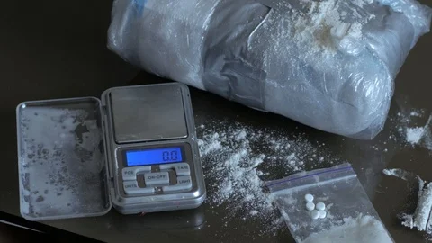 Drugs on the table Stockbeeldmateriaal 104574344