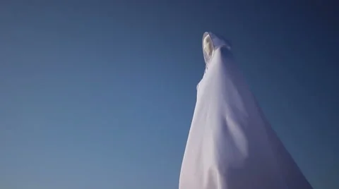 Druid against a blue sky Stock Footage 47713864
