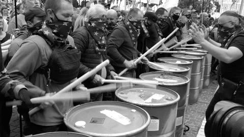 Drum battle, fine drum rolls, punches, knocking on the square with protesters. Stock Footage 134635904