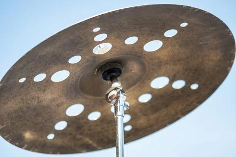 Drum bell on a blue background Stock Photos