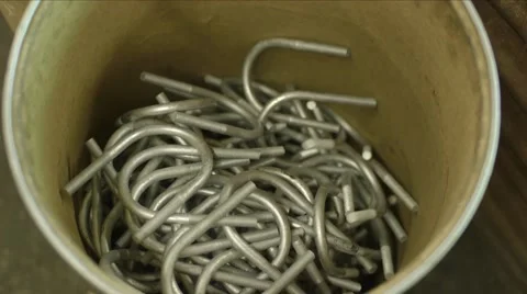 Drum Filling up with U-Bolts Stock Footage 40870204