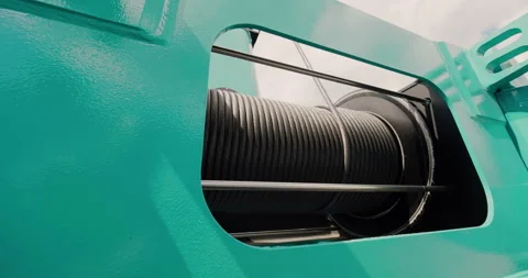 Drum hoist winch. Mobile crane electric drum winch. Hoist drum-winch head. Video stock 138078934