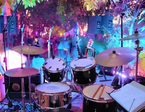 Drum kit set up on stage ready to play the gig. Stock Photos