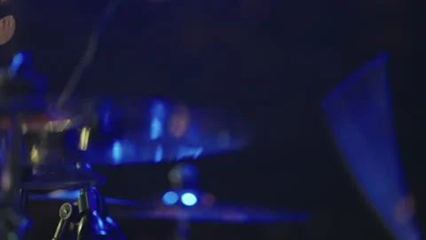 Drum kit in stage during gig, drummer is striking drums and cymbals, closeup Stock Footage 218315799
