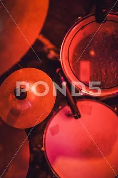 Drum kit on stage in the spotlight color. Stock Photos