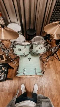 Drum kit top view and a young guy without a face Stock Photos